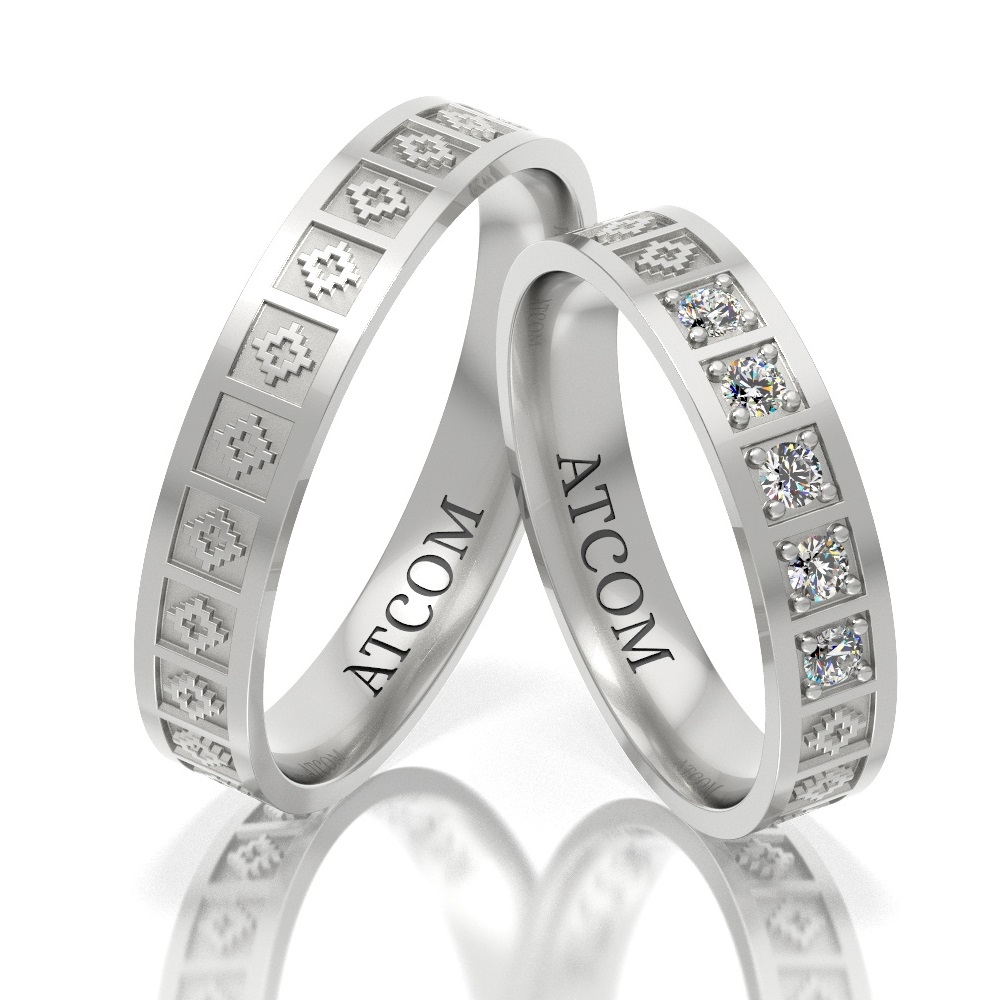 Verighete ATCOM CRINA din aur alb despartite in trei prin doua santulete incrustate cu cate o pietricica de zirconiu sau diamant